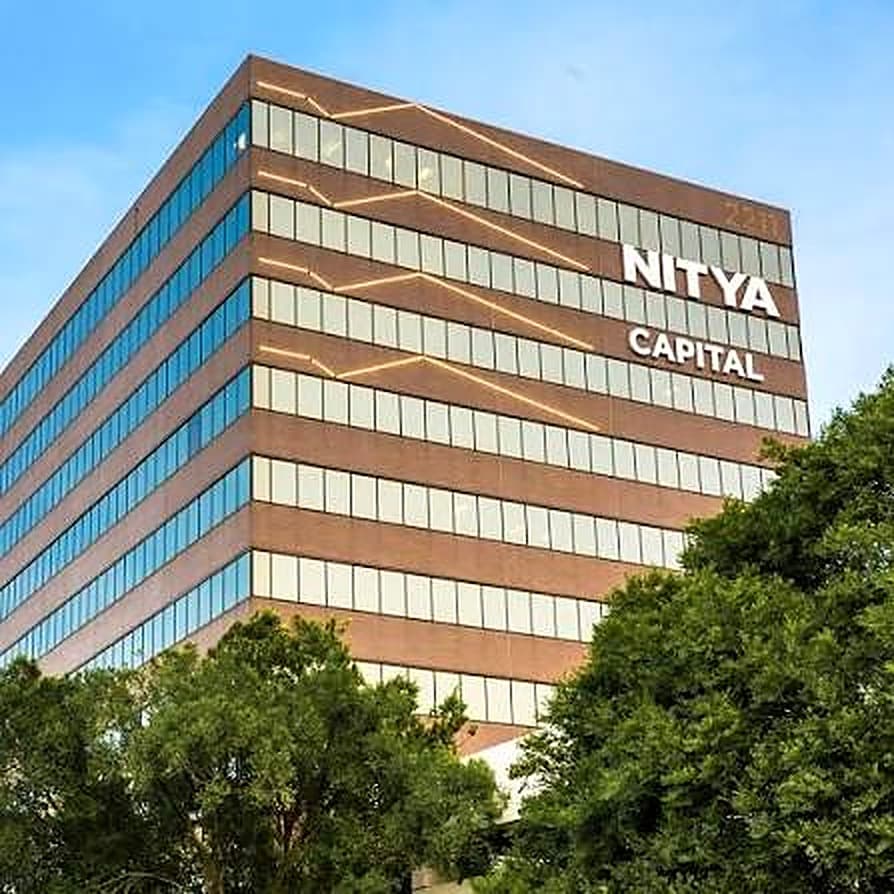 NITYA CAPITAL signage on the exterior of the firm's Houston office building